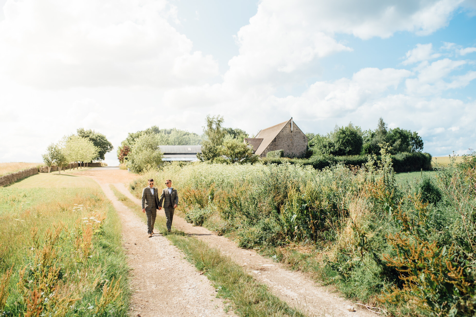 Stone Barn Cotswolds, stone barn wedding, cotswolds wedding, queer wedding, dogs at wedding