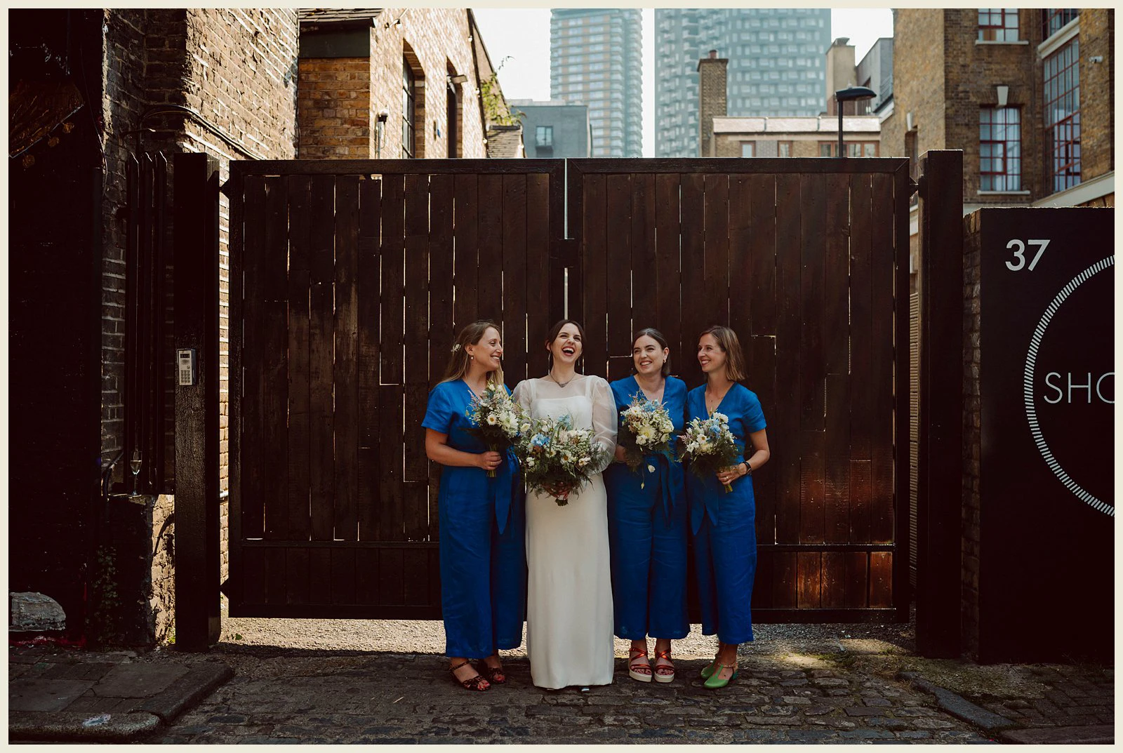 shoreditch studios wedding, bridal party group shot, fun wedding, shoreditch wedding photographer, shoreditch studios wedding photographer